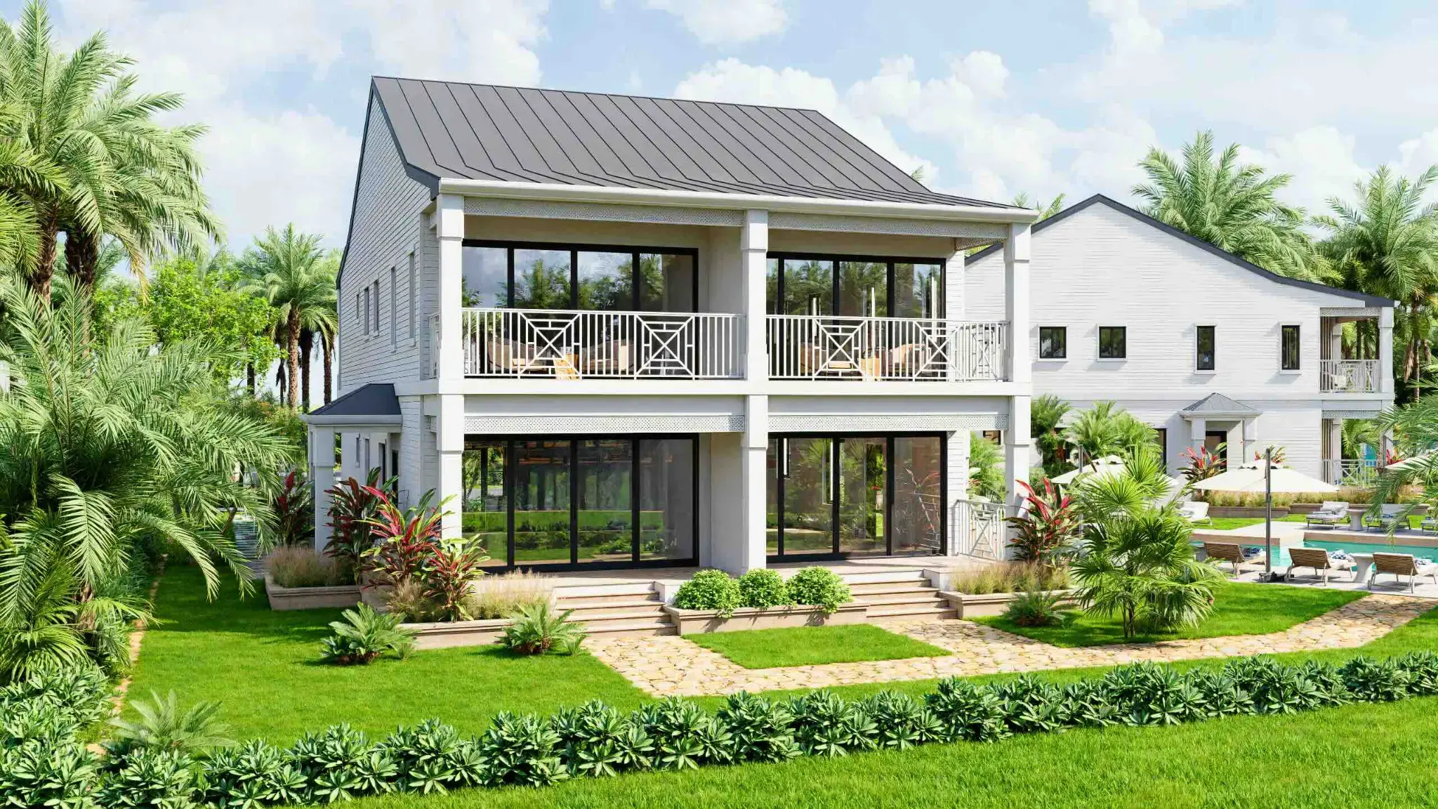 Karibischer Baustil mit klassischem Metalldach und umlaufender Veranda bei Alma Residences, Grand Bahama