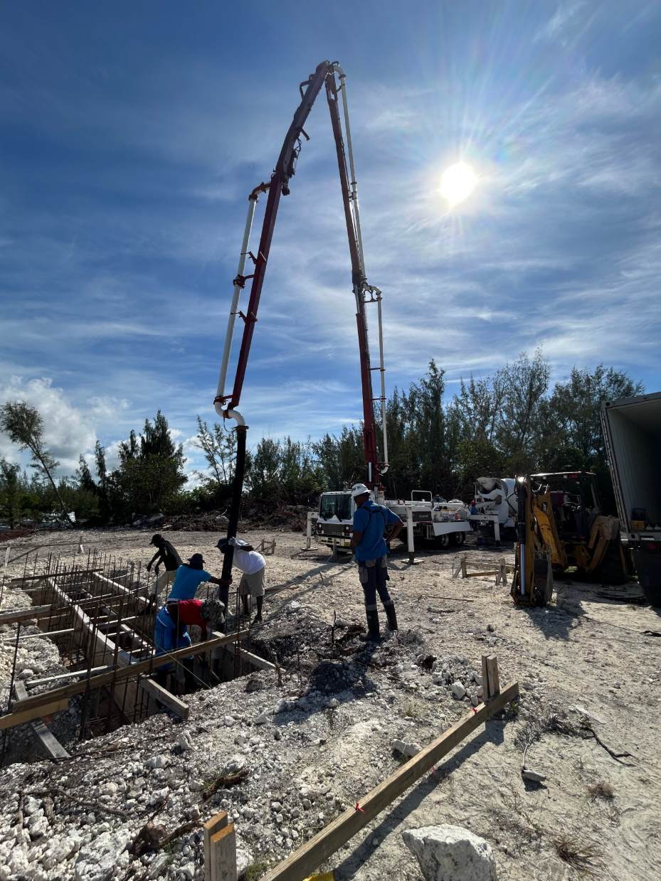 Concrete pump delivering duty-free imported material on the CPH site